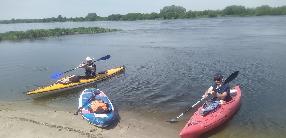 Żółty kajak. Sup. Czerwony kajak.